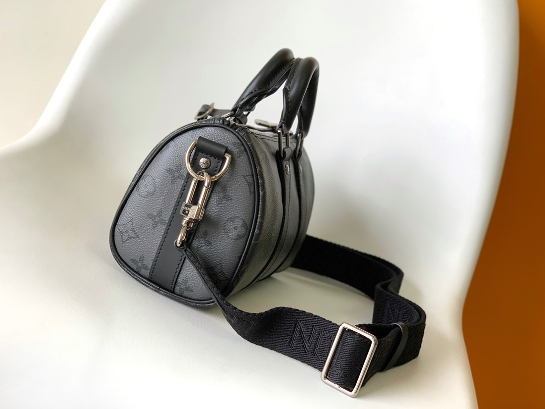 KEEPALL BANDOULIÈRE 25 IN BLACK MONOGRAM HERITAGE CANVAS