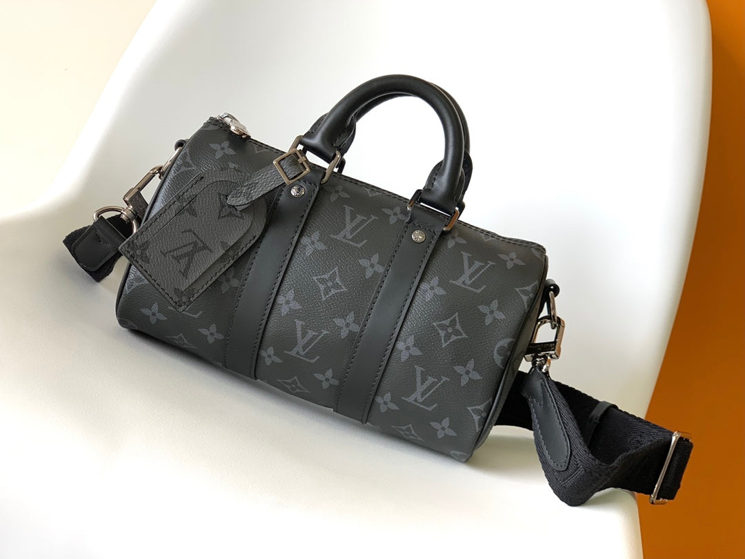 KEEPALL BANDOULIÈRE 25 IN BLACK MONOGRAM HERITAGE CANVAS