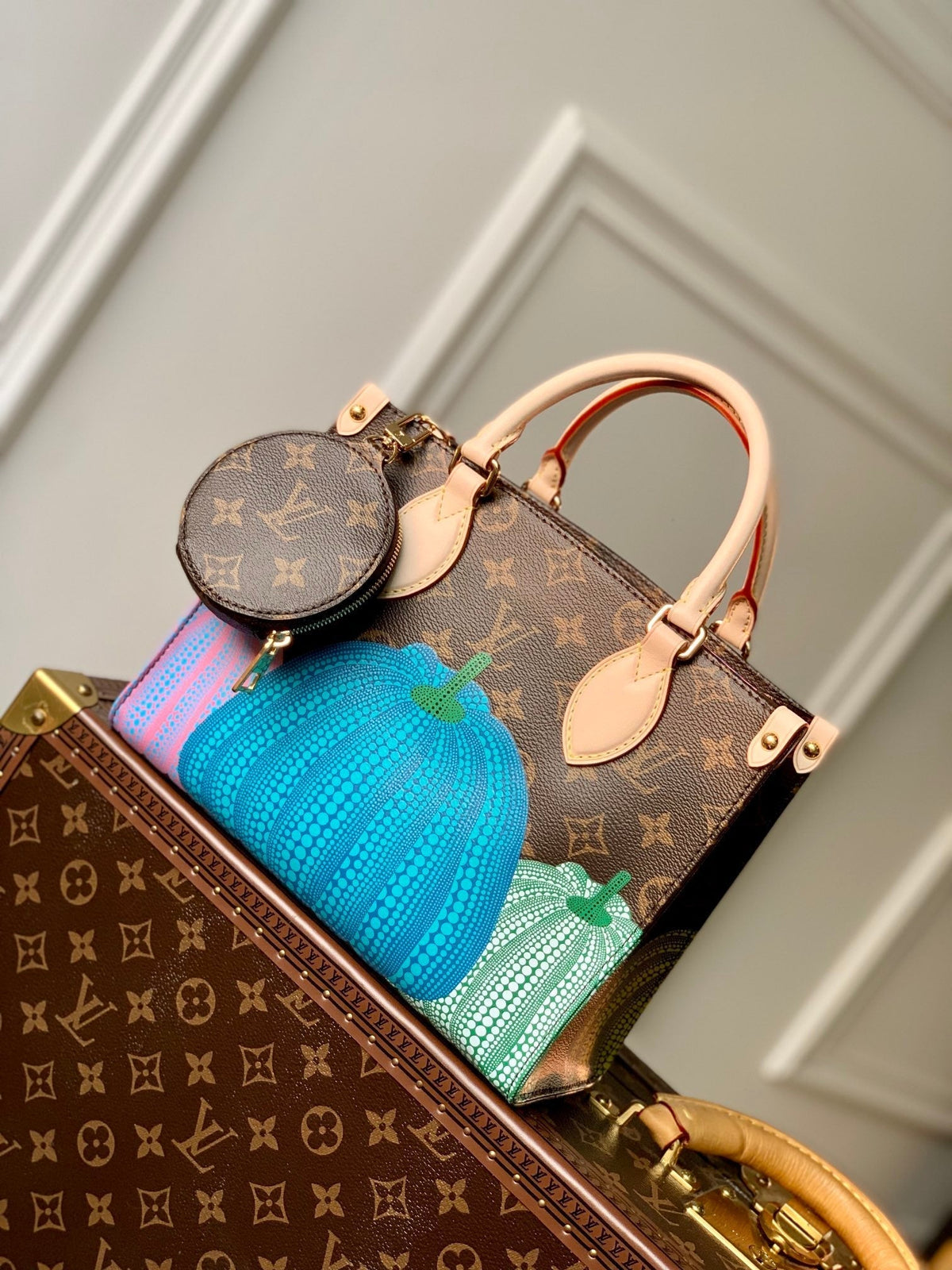 LV x YK ONTHEGO 25 IN BROWN MONOGRAM COATED CANVAS AND CALFSKIN PUMPKIN PATTERN