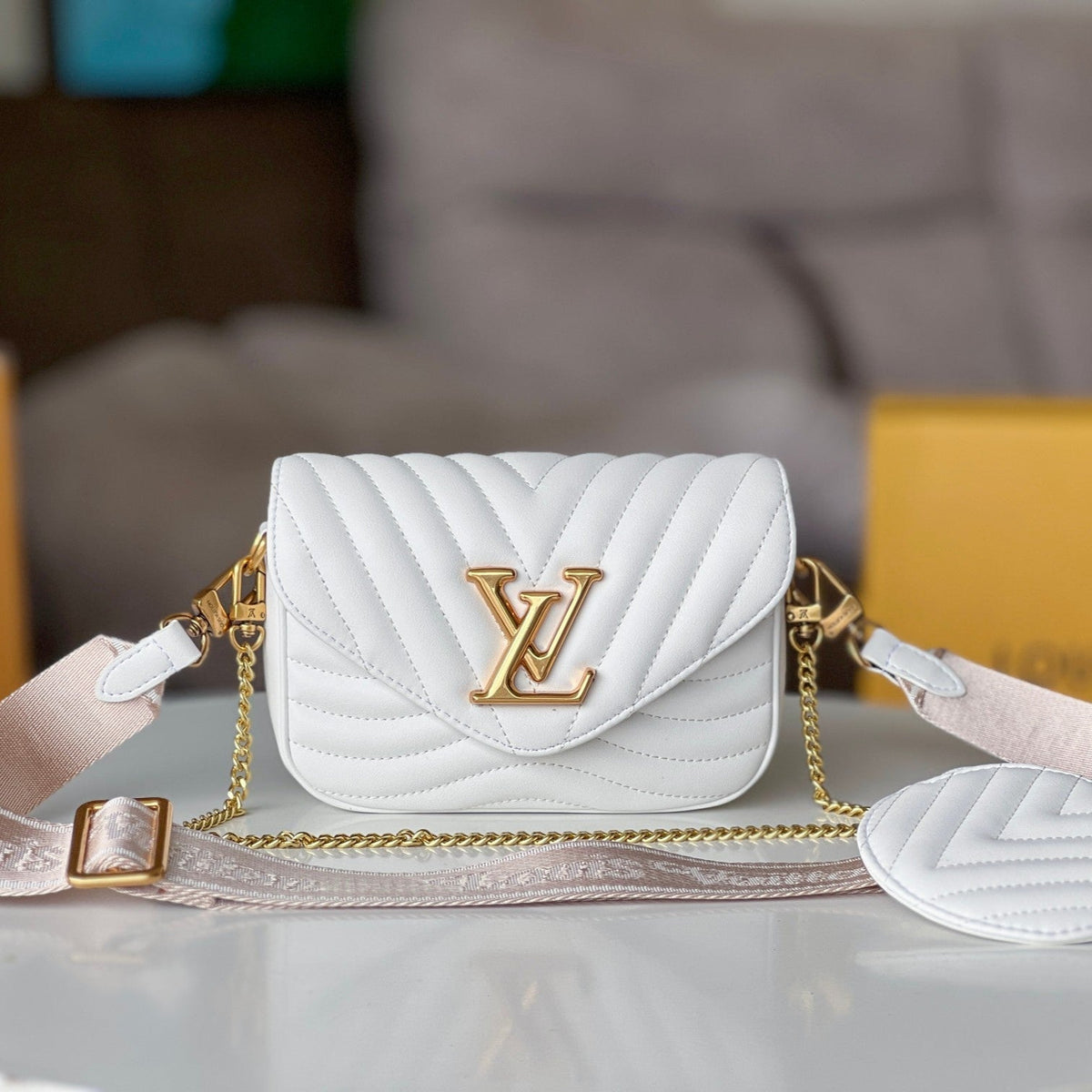 LV 25S WAVE MULTI POCHETTE 19 IN WHITE CALFSKIN GOLD HARDWARE