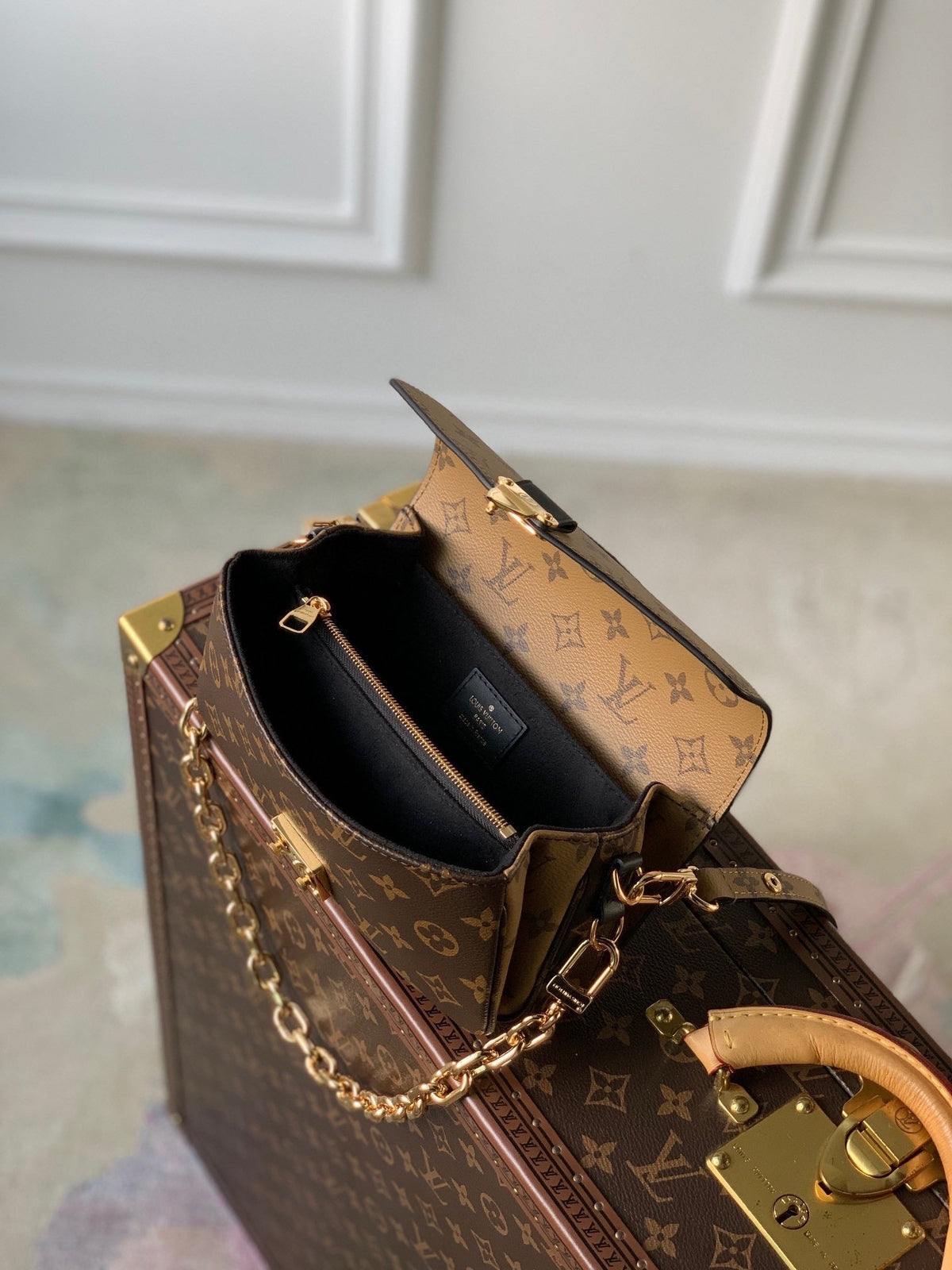 POCHETTE MÉTIS EAST WEST 21.5 IN BROWN MONOGRAM COATED CANVAS AND CALFSKIN