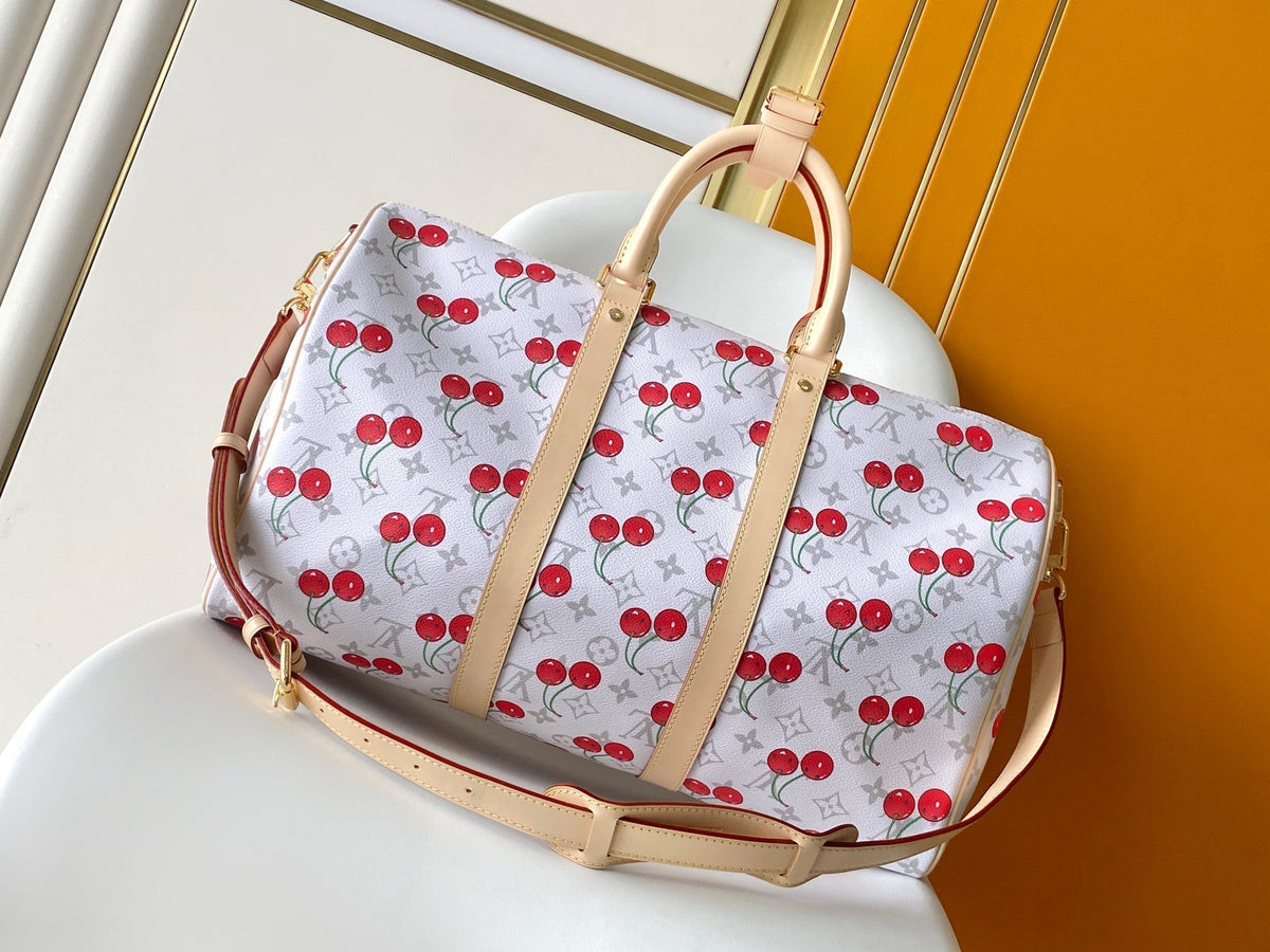 KEEPALL BANDOULIÈRE 45 IN WHITE AND RED CALFSKIN