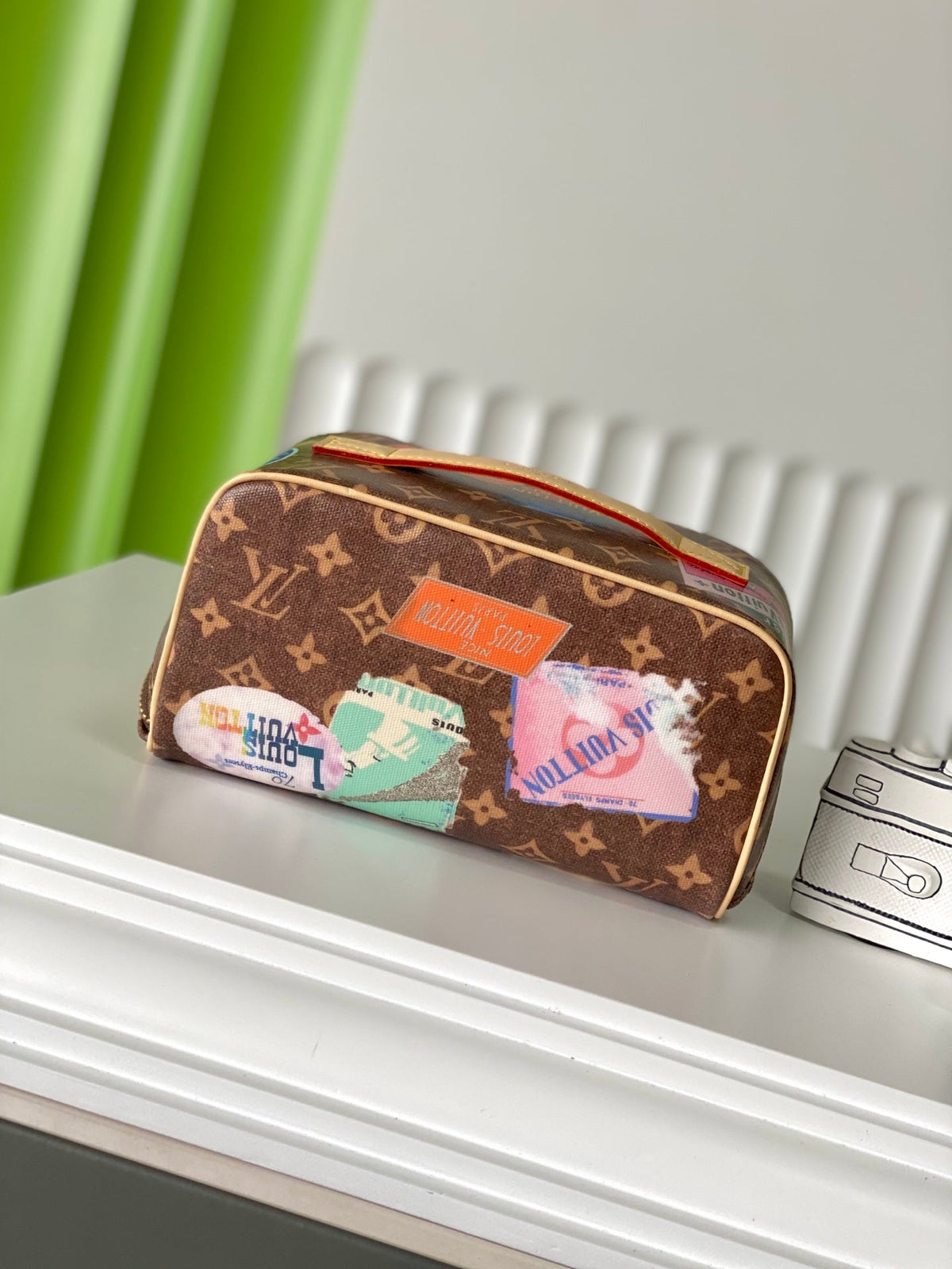 COMPARTMENTS 24 IN BROWN MONOGRAM CANVAS WITH GOLD LOCK