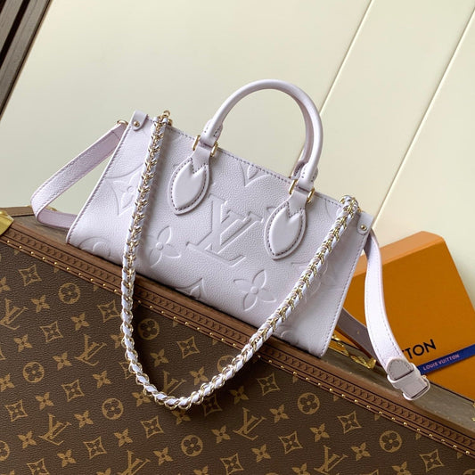 LV 25S ONTHEGO EAST WEST BAG 25 IN LIGHT LAVENDER CALFSKIN MONOGRAM EMPREINTE
