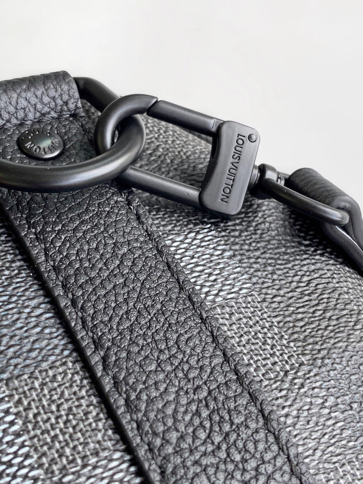 LV 25S KEEPALL BANDOULIÈRE 25 BAG IN DAMOFLAGE BLACK CALFSKIN